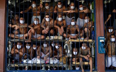 Gang members are seen inside a cell at Quezaltepeque jail during a media tour, in Quezaltepeque, El Salvador September 4, 2020. REUTERS/Jose Cabezas TPX IMAGES OF THE DAY
